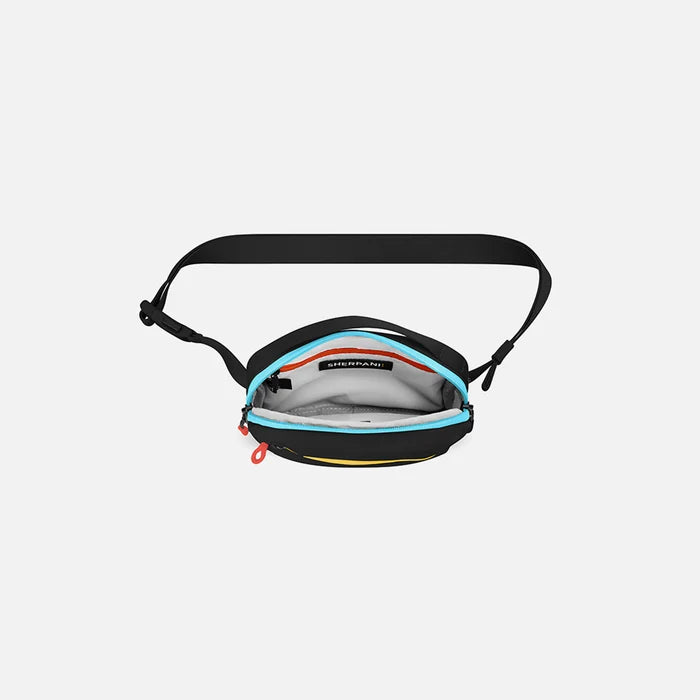 A Sherpani Hyk Chromatic Black Hip Pack, above view showing inside of main pocket on white backdrop. #color_chromatic-black