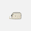 A Sherpani Hyk Terrazzo Print Hip Pack, front view showing pocket and straps on white backdrop. #color_terrazzo-print