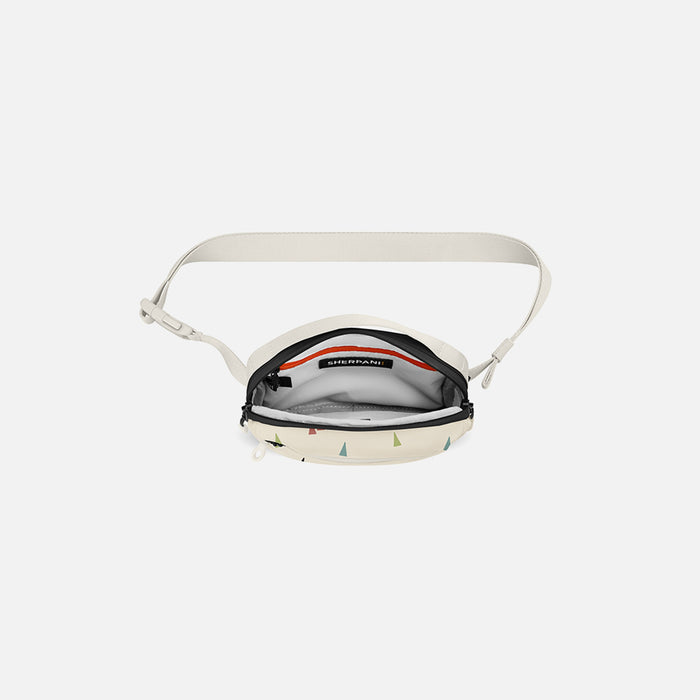 A Sherpani Hyk Terrazzo Print Hip Pack, above view showing inside of main pocket on white backdrop. #color_terrazzo-print