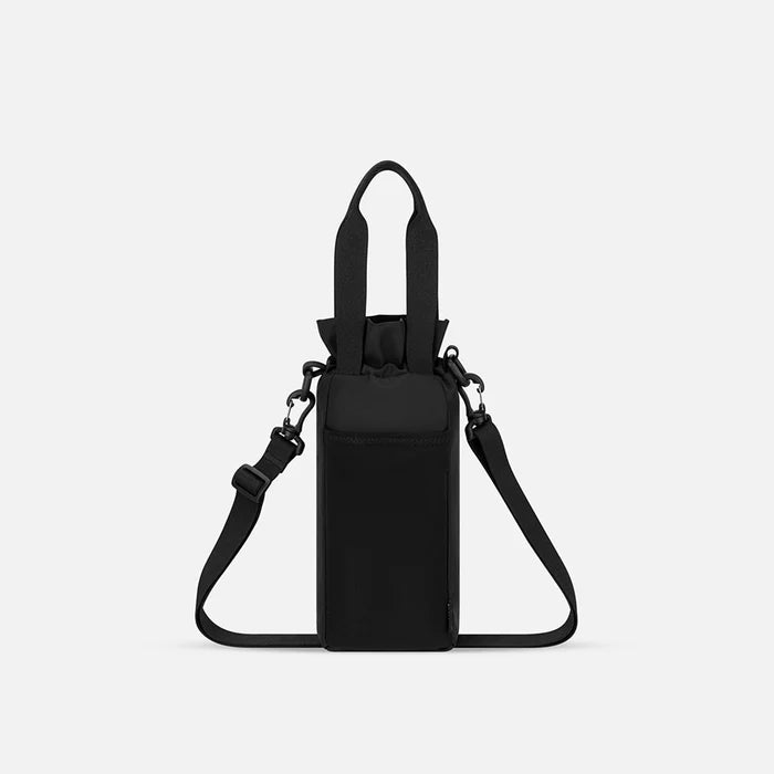 A Sherpani Izzie Chromatic Black Water Bottle Crossbody, back view showing strap and back pocket on white background.  #color_chromatic-black