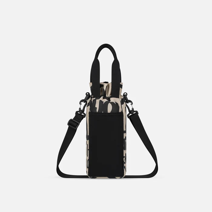 A Sherpani Izzie Ciao Water Bottle Crossbody, back view showing strap and back pocket on white background.  #color_ciao-print