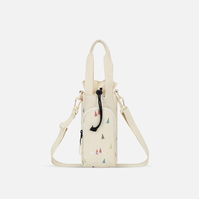 A Sherpani Izzie Terrazzo Print Water Bottle Crossbody, front view showing strap and front pocket on white background.  #color_terrazzo-print