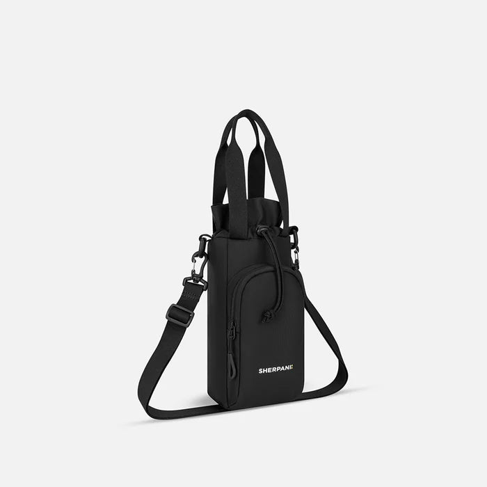 A Sherpani Izzie Raven Black Water Bottle Crossbody, 3/4 view showing strap and front pocket on white background.   #color_raven-black