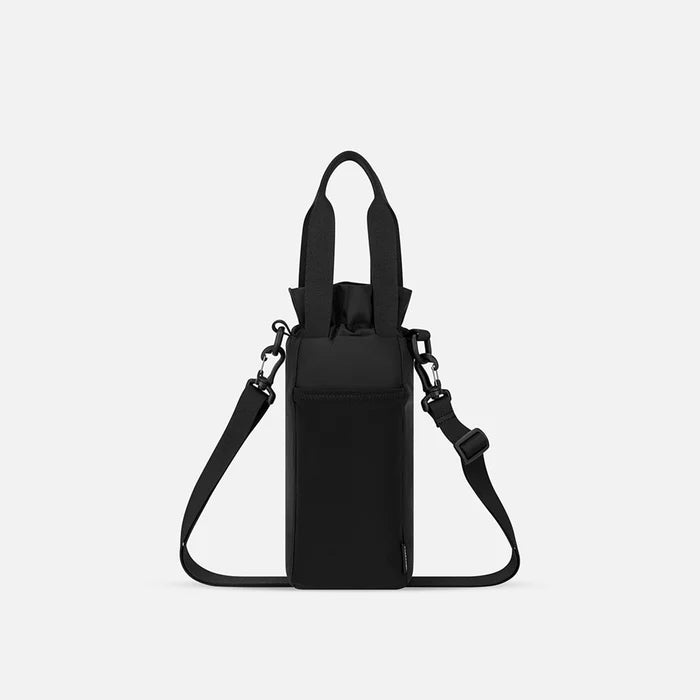 A Sherpani Izzie Raven Black Water Bottle Crossbody, back view showing strap and back pocket on white background.  #color_raven-black