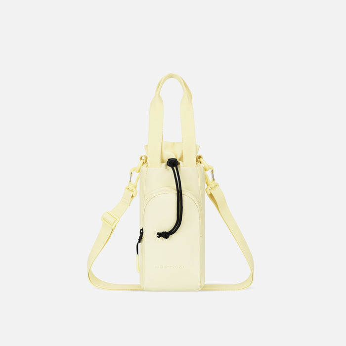 A Sherpani Izzie Sol Yellow Water Bottle Crossbody, front view showing strap and front pocket on white background.  #color_sol-yellow