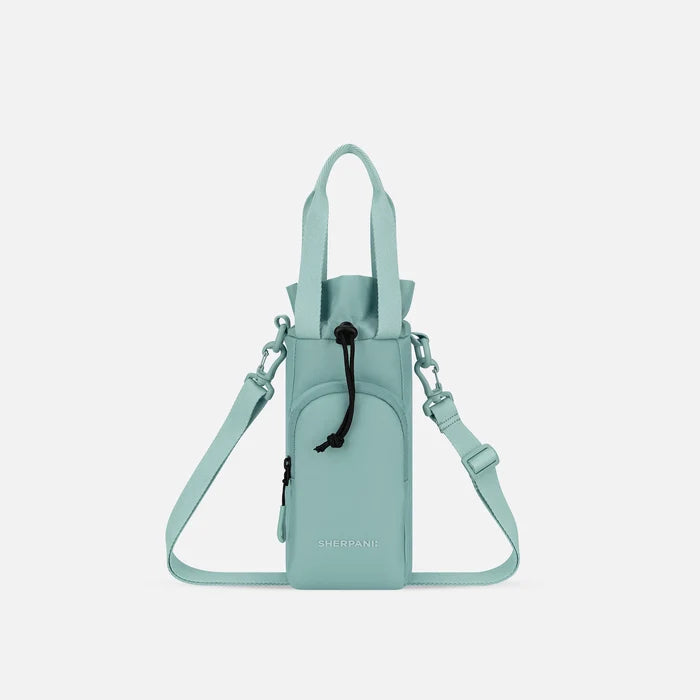 A Sherpani Izzie Surf Blue Water Bottle Crossbody, front view showing strap and front pocket on white background.  #color_surf-blue