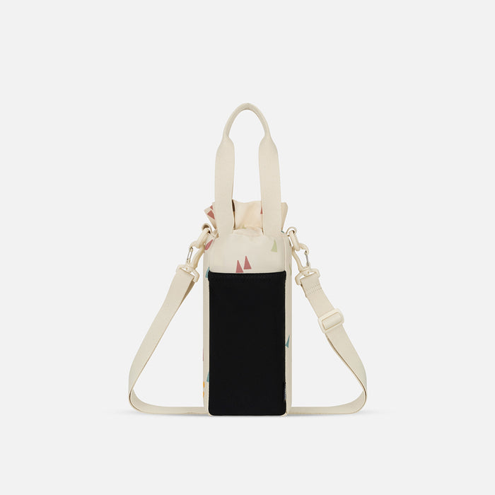 A Sherpani Izzie Terrazzo Print Water Bottle Crossbody, back view showing strap and back pocket on white background.  #color_terrazzo-print