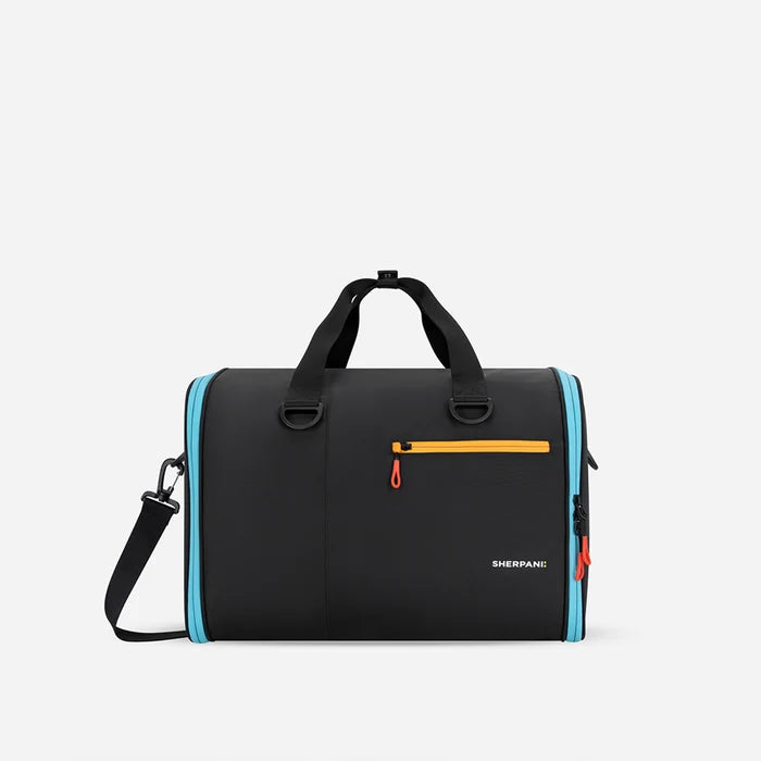 A Sherpani Jaunt Chromatic Black Garment Duffle, front view showing straps & lockable pocket on white backdrop.   #color_chromatic-black