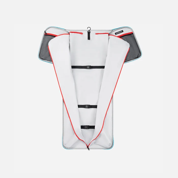 A Sherpani Jaunt Chromatic Black Garment Duffle, above unzipped view showing foldable packing pockets on white backdrop. #color_chromatic-black