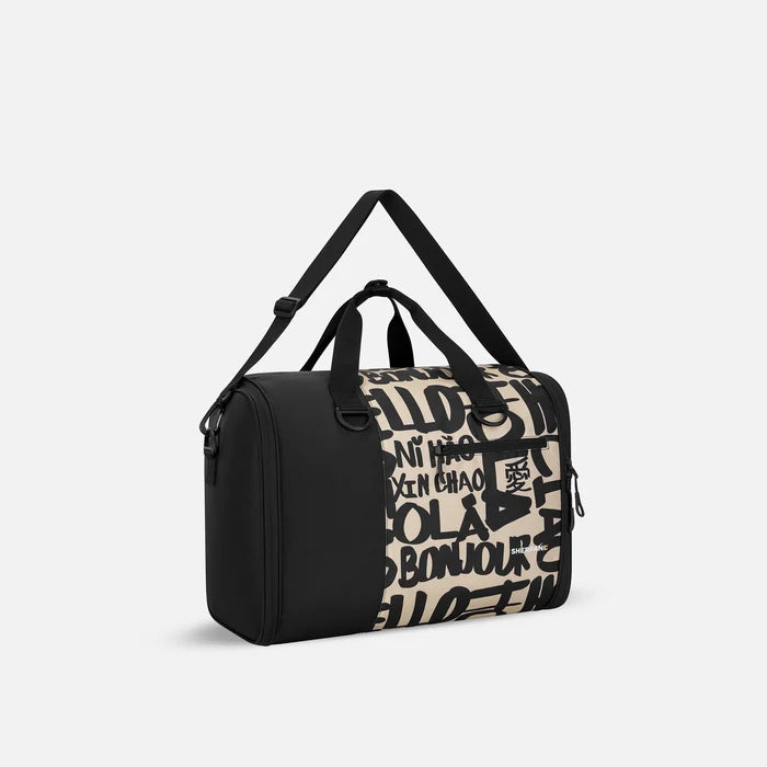 A Sherpani Jaunt Ciao Garment Duffle, 3/4 view showing two strap options on white backdrop.#color_ciao-print