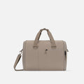 A Sherpani Jaunt Dune Garment Duffle, front view showing straps & lockable pocket on white backdrop. #color_dune-tan