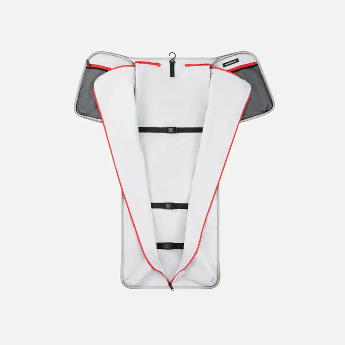 A Sherpani Jaunt Dune Garment Duffle, above unzipped view showing foldable packing pockets on white backdrop. #color_dune-tan