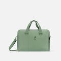 A Sherpani Jaunt Olivine Garment Duffle, front view showing straps & lockable pocket on white backdrop.   #color_olivine-green