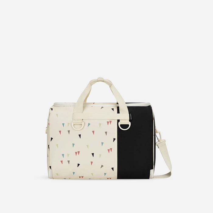 A Sherpani Jaunt Terrazzo Print Garment Duffle, back view showing straps & luggage strap on white backdrop.    #color_terrazzo-print