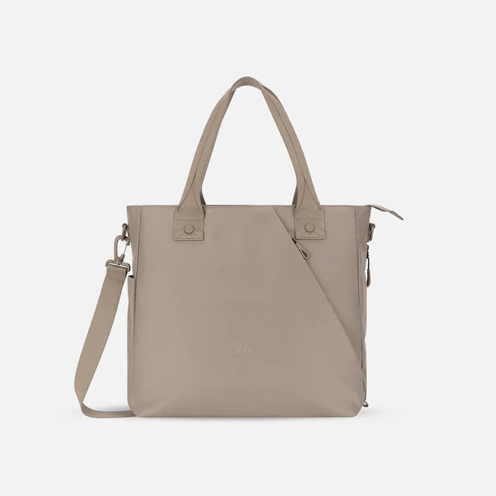 A Sherpani Jetsetter Dune Travel Tote Bag, front view showing two strap options on white backdrop.  #color_dune-tan