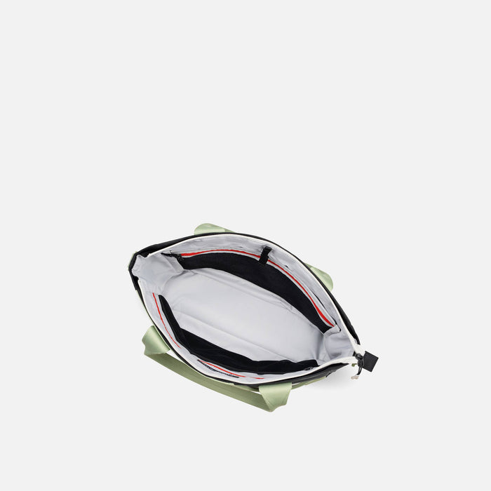 A Sherpani Jetsetter Palm Green Travel Tote Bag, above view showing inside pockets on white backdrop. #color_palm-green