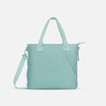 A Sherpani Jetsetter Surf Blue Travel Tote Bag, front view showing two strap options on white backdrop. #color_surf-blue
