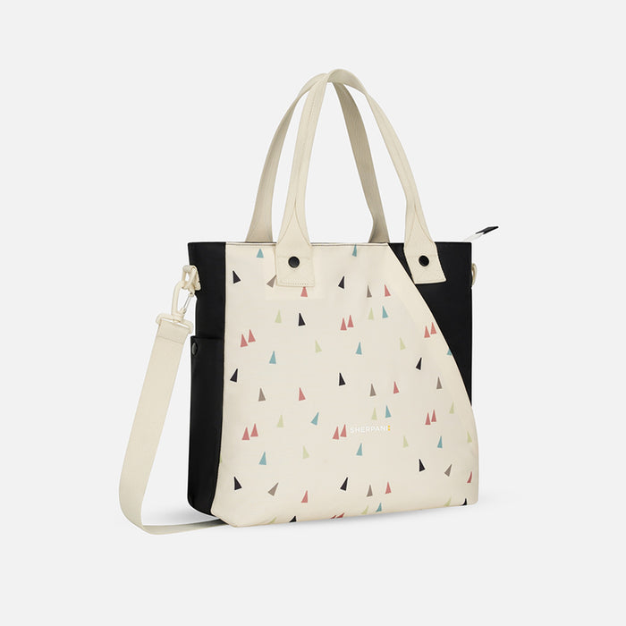 A Sherpani Jetsetter Terrazzo Print Travel Tote Bag, 3/4 view showing two strap options on white backdrop. #color_terrazzo-print