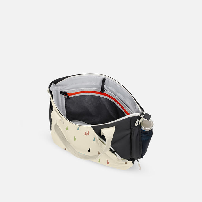 A Sherpani Jetsetter Terrazzo Print Travel Tote Bag, above view showing inside pockets on white backdrop. #color_terrazzo-print