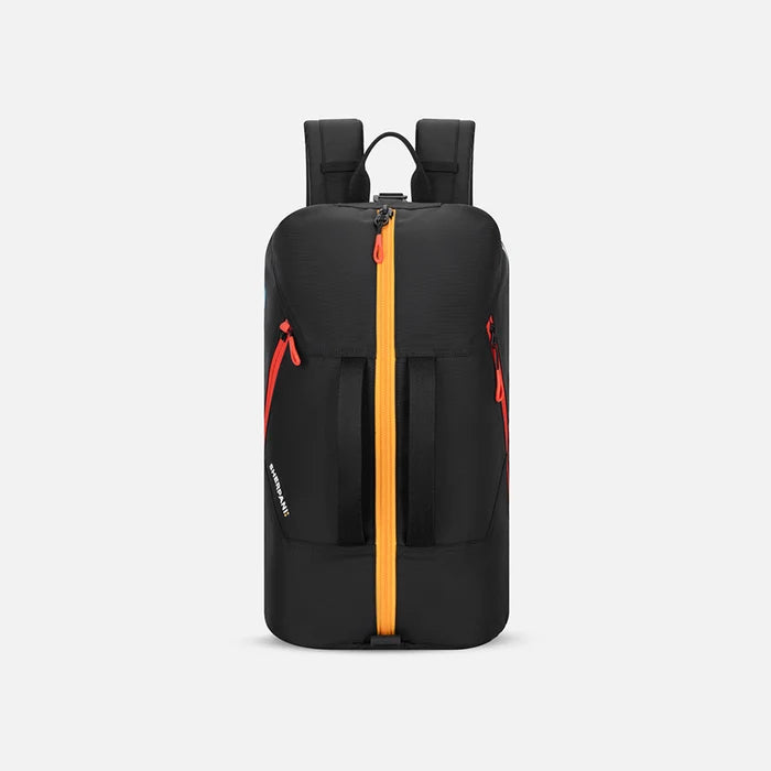 A Sherpani Juno Chromatic Black Duffel Backpack, front view showing duffle straps and main pocket on white backdrop.  #color_chromatic-black