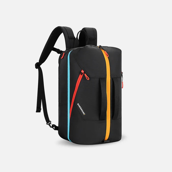A Sherpani Juno Chromatic Black Duffel Backpack, 3/4 view showing duffle straps and main pocket on white backdrop.   #color_chromatic-black