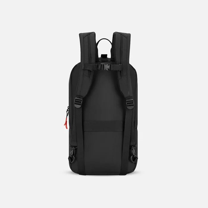 A Sherpani Juno Chromatic Black Duffel Backpack, back view showing shoulder straps with buckle on white backdrop.  #color_chromatic-black