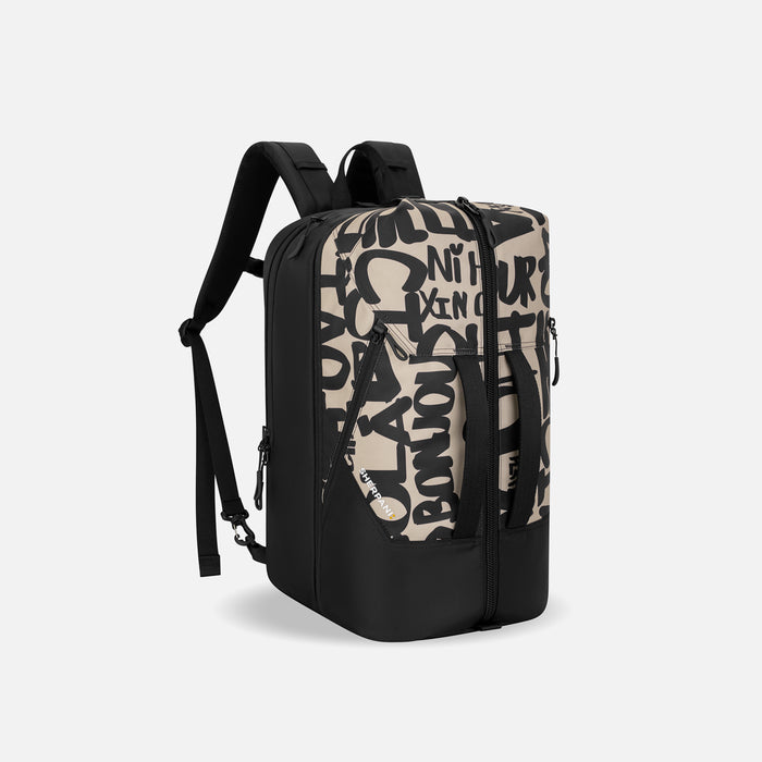 A Sherpani Juno Ciao Duffel Backpack, 3/4 view showing duffle straps and main pocket on white backdrop.   #color_ciao-print