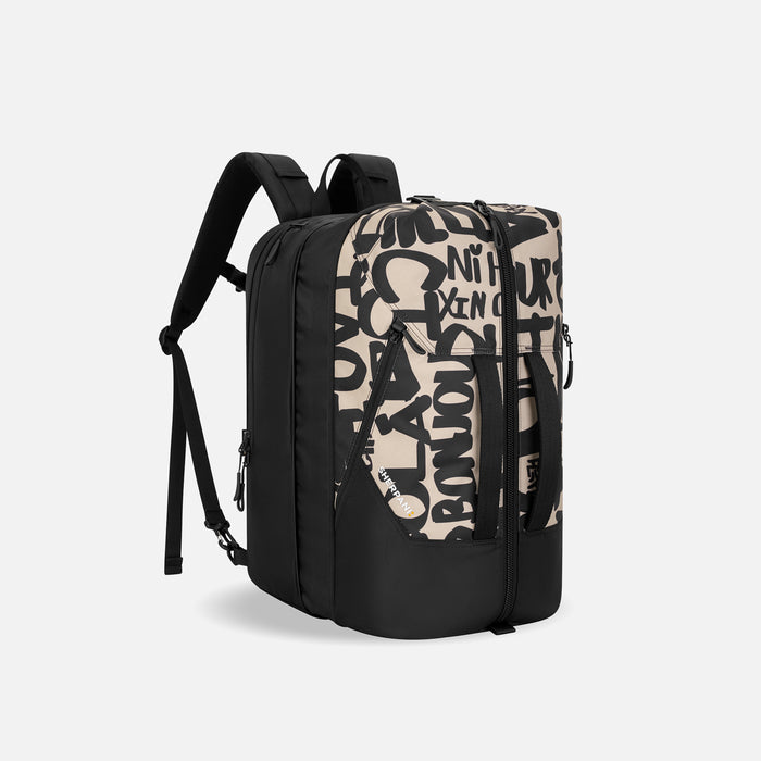 A Sherpani Juno Ciao Duffel Backpack, 3/4 view showing duffle straps and main pocket on white backdrop.   #color_ciao-print