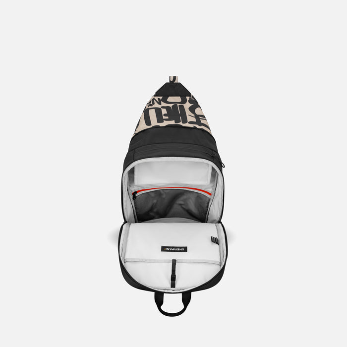 A Sherpani Juno Ciao Duffel Backpack, above view showing inside main pocket on white backdrop.   #color_ciao-print