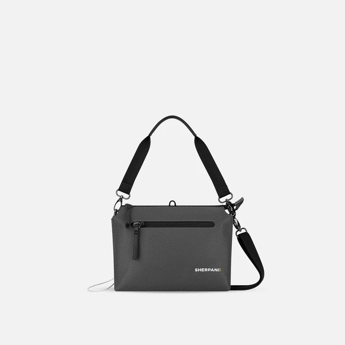 A Sherpani Mei Granite Anti-theft Travel Trio Crossbody, front view showing lockable pockets on white backdrop.   #color_granite-grey
