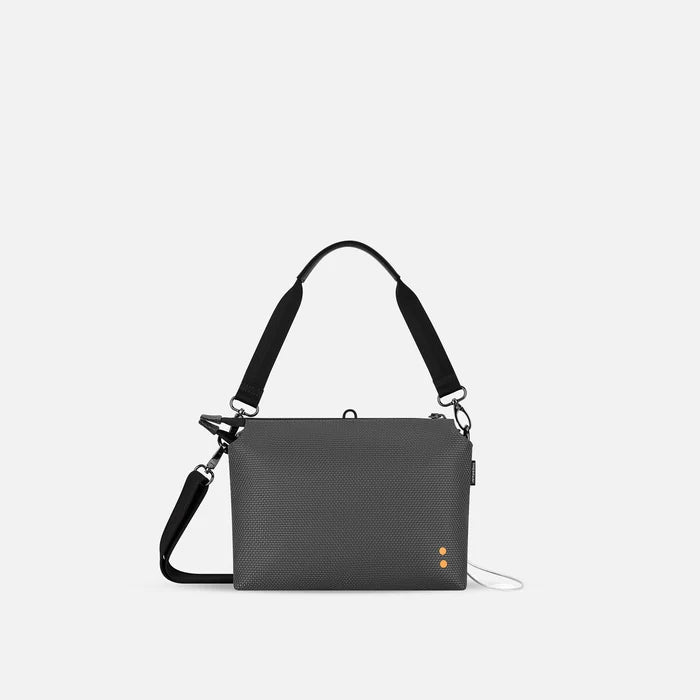 A Sherpani Mei Granite Anti-theft Travel Trio Crossbody, back view showing strap options on white backdrop.  #color_granite-grey