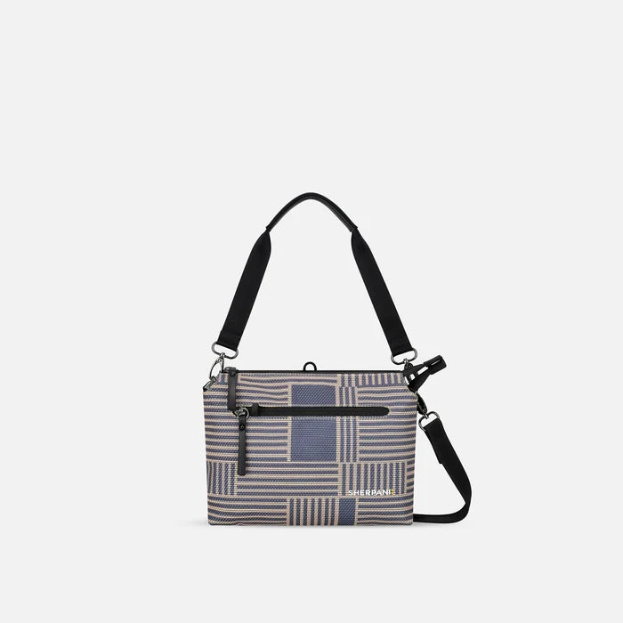 A Sherpani Mei Passport Anti-theft Travel Trio Crossbody, front view showing lockable pockets on white backdrop.   #color_passport-print