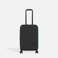 A Sherpani Meridian Chromatic Black Carry-On Luggage, front view showing handle and zipper extender on white backdrop.   #color_chromatic-black