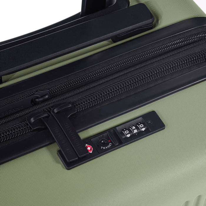 Close up of a Sherpani Meridian Matcha Carry-On Luggage, showing zipper code lock. #color_matcha-green