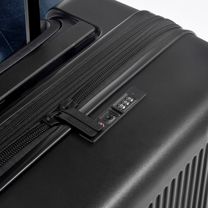 Close-up of zipper code lock on a Sherpani Meridian Black Checked-Luggage. #color_black