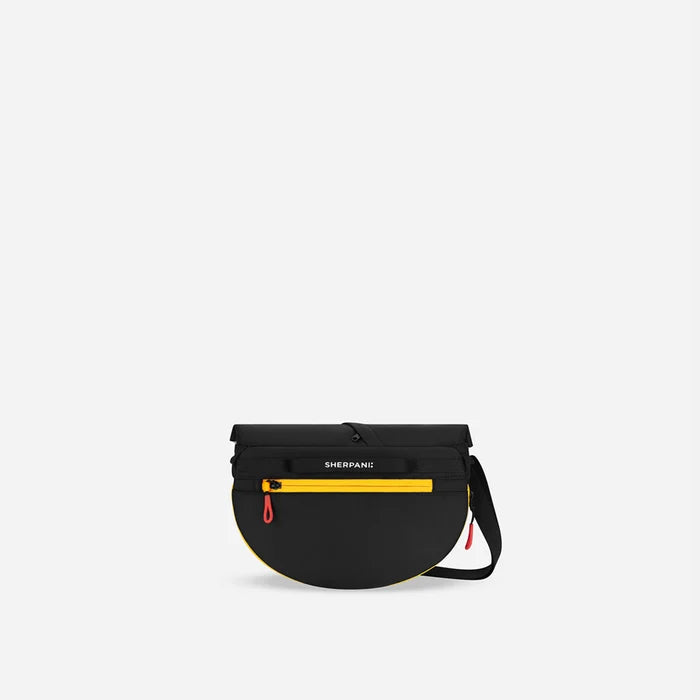 A Sherpani Milli Chromatic Black Mini Messenger, back view showing black backside. #color_chromatic-black
