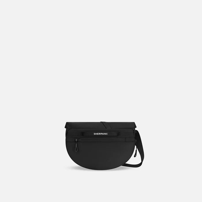 A Sherpani Milli Raven Black Mini Messenger, back view showing black backside. #color_raven-black