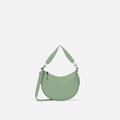 A Sherpani Mina Olivine Medium Crossbody Bag, front view showing strap options on white background.  #color_olivine-green