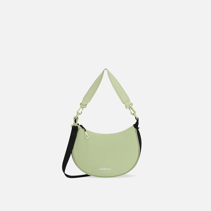 A Sherpani Mina Palm Green Medium Crossbody Bag, front view showing strap options on white background.  #color_palm-green