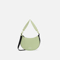 A Sherpani Mina Palm Green Medium Crossbody Bag, front view showing strap options on white background.  #color_palm-green