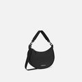 A Sherpani Mina Raven Black Medium Crossbody Bag, 3/4 view showing strap options on white background.  #color_raven-black