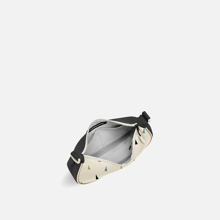 A Sherpani Mina Terrazzo Print Medium Crossbody Bag, above view showing inside main pocket on white background.  #color_terrazzo-print