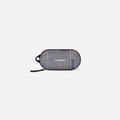 A Sherpani Mini Co-Pilot Passport Mini Travel Organizer, front view showing side handle and main zipper against white background. #color_passport-print