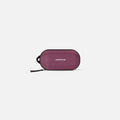 A Sherpani Mini Co-Pilot Smoky Orchid Mini Travel Organizer, front view showing side handle and main zipper against white background #color_smoky-orchid-pink
