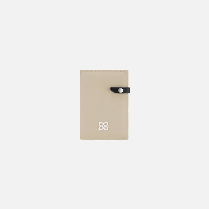 A Sherpani Osaka Moab Passport Holder, front view showing clasp on white background.  #color_moab