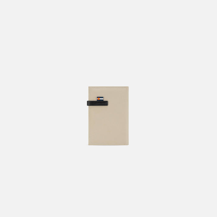 A Sherpani Osaka Moab Passport Holder, back view against white background.  #color_moab