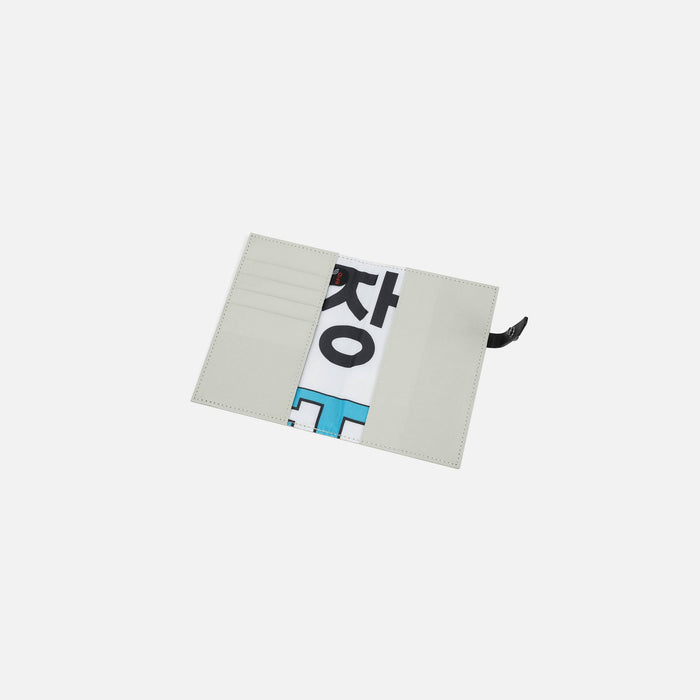 A Sherpani Osaka Moab Passport Holder, above view showing inside card holders on white background.  #color_moab