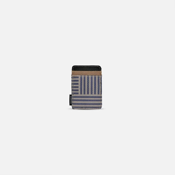 A Sherpani Porter Passport Credit Card Sleeve Wallet, front view showing card holders against a white background.  #color_passport-print