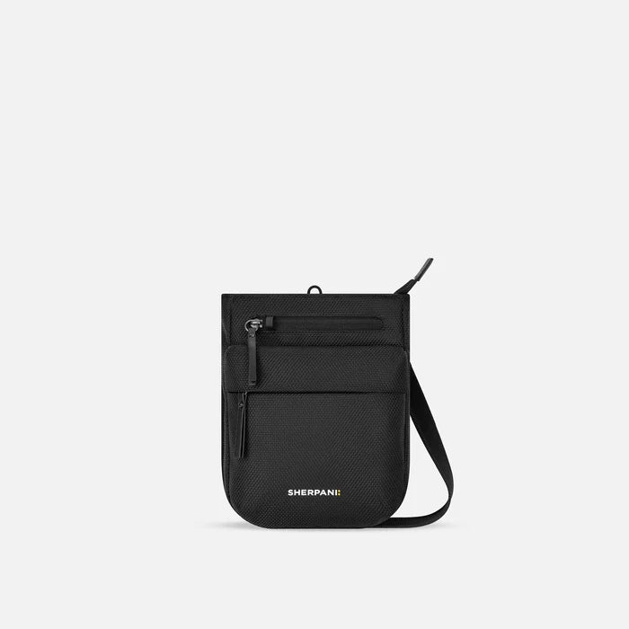A Sherpani Prima Carbon Black Anti-theft Travel Crossbody, front view showing lockable pocket and strap on white background. #color_carbon-black
