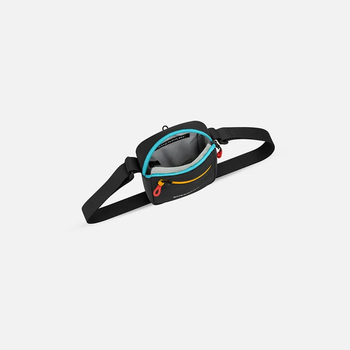 Sherpani Rogue Chromatic Black Mini Crossbody, above view showing inside of main zipper pocket on white background.   #color_chromatic-black